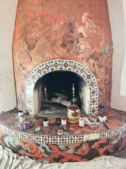 Copper-fired hearth with tiles